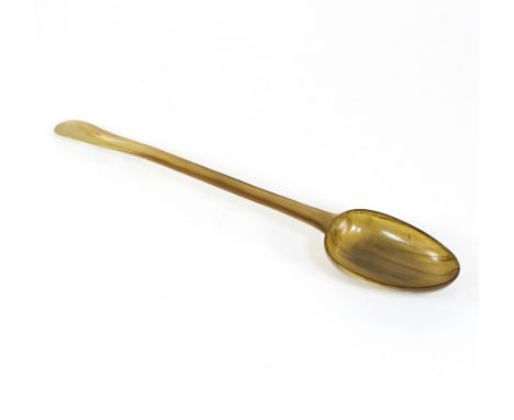 An 18th Century rat-tail horn serving spoon, 47cm long
