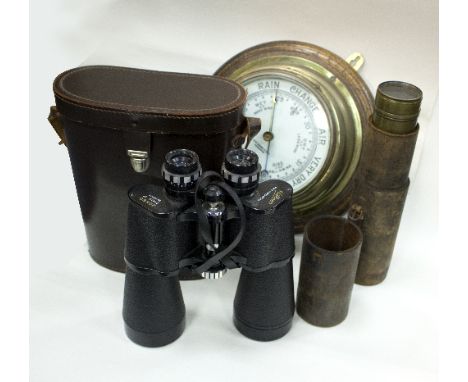 A circular aneroid barometer, John Barker & Co., London, on an oak mount, 28cm diameter, a four-draw telescope, Ross, London 