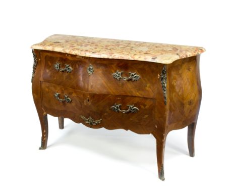 A French kingwood marquetry serpentine commode fitted two long drawers, gilt metal floral mounts and a marble top, 127cm wide