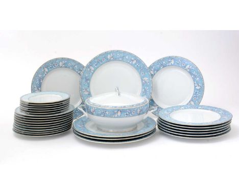A part Limoges porcelain dinner service by Philippe Deshoulieres, with blue and gilt printed floral borders comprising; veget