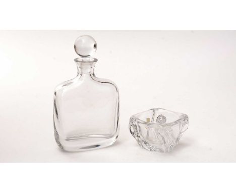 A Daum clear glass decanter and stopper, of square form, signed to side 'Daum France', 26cms high; and a small pestle and mor