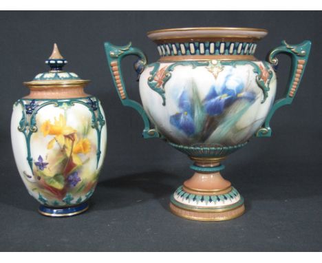 ROYAL WORCESTER HADLEY'S PORCELAIN TWIN HANDLED URN SHAPED VASE on a circular stepped relief foliate base overall decorated w