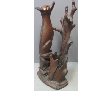 BLACK FOREST STYLE STICK STAND in the form of a seated fox with stylized trunk and twigs on a naturalistic base. 82cm high ap