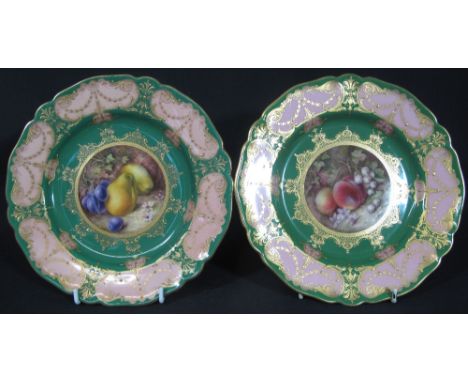 TWO SIMILAR ROYAL WORCESTER DESSERT PLATES dated 1912 and 1916, painted and signed by R Sebright with fruit on a woodland ban