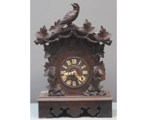 LATE 19TH CENTURY BAVARIAN TWO TRAIN CUCKOO CLOCK, the case with bird pediment and trailing vine decoration, gothic numerals 