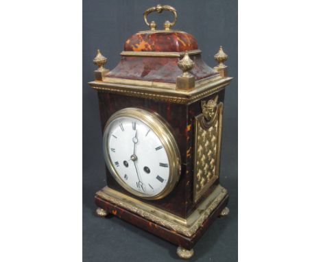 19TH CENTURY GILT METAL MOUNTED TORTOISESHELL VENEERED TWO TRAIN BRACKET CLOCK having stepped hood with handle, urn shaped fi