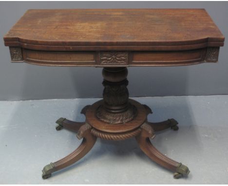 REGENCY MAHOGANY BREAK FRONT FOLD OVER CARD TABLE having baize lined surface, foliate moulded panels to the frieze on a balus