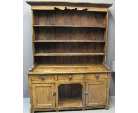 19TH CENTURY PEMBROKESHIRE PINE DOG KENNEL DRESSER having boarded three shelf rack back under a shaped frieze, the base with 