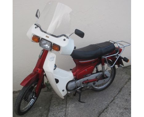 1988 HONDA C90 CUB STEP THROUGH MOTORCYCLE, Rickman accessory fairing and carrier. 9086 miles. One local elderly lady owner f