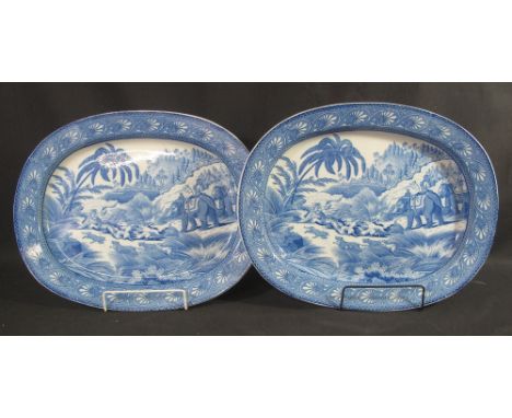 PAIR OF 19TH CENTURY STAFFORDSHIRE BLUE AND WHITE TRANSFER PRINTED PEARLWARE OVAL MEAT DISHES decorated with Indian tiger hun