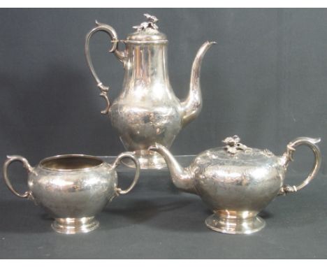 VICTORIAN SILVER THREE PIECE TEA SERVICE comprising bullet shaped teapot, coffee pot and two handled sucrier, the teapot and 