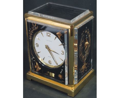JAEGER LE COULTRE SWISS BLACK AQUARIUM 'MARINA' ATMOS CLOCK with gilt brass frame and lucite tropical fish aquarium panels, w