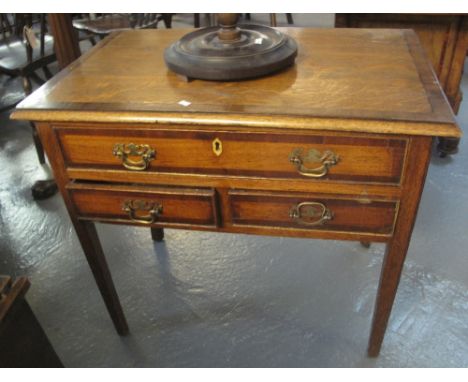 EARLY 19TH CENTURY OAK LOWBOY having single plank moulded top above one long and two cock beaded drawers with brass loop hand