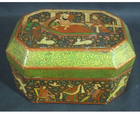 19TH CENTURY INIDAN LACQUERED OCTAGONAL BOX AND COVER copiously decorated in Indian Mughal taste with figure in an interior, 