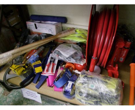 A large mixed collection of tools to include sledgehammers, brozner tin opener, ratchet straps, fire extinguishers and hose, 