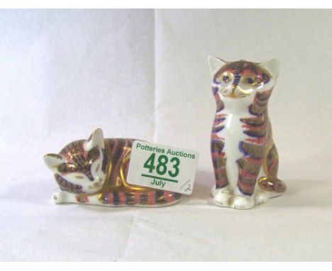 Royal Crown Derby paperweights seated kitten and lying kitten, both with silver stoppers (2) 