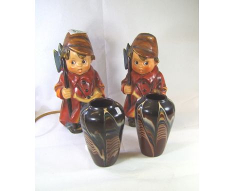 Pair Goebel pottery lampbases as boy soldiers and a pair of small art pottery vases (4) 