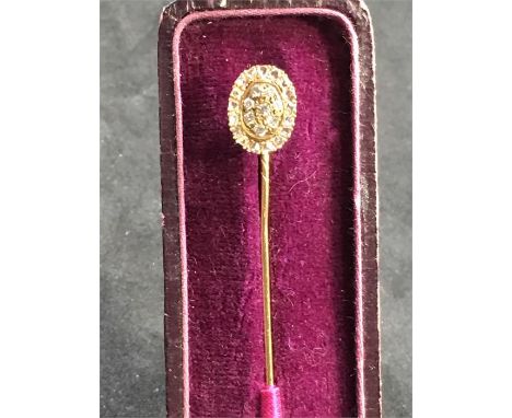 Antique diamond stick pin diamond cluster head set in high carat head measures approx 12mm by 9mm total length 72mm long come