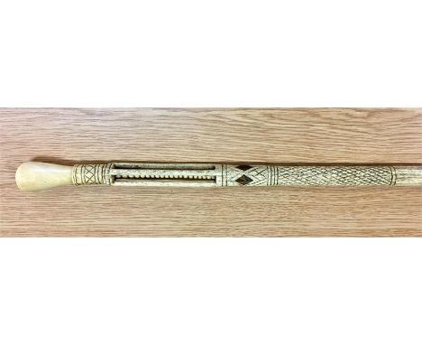 Antique whale bone walking stick carved open work handle and inlaid measures approx 36ims long handle loose 