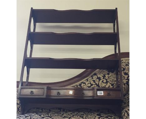 Mahogany 3 drawer serpentine centre drawer 3 shelf wall rack measures approx  27" wide by 34" heigh and 7"deep 