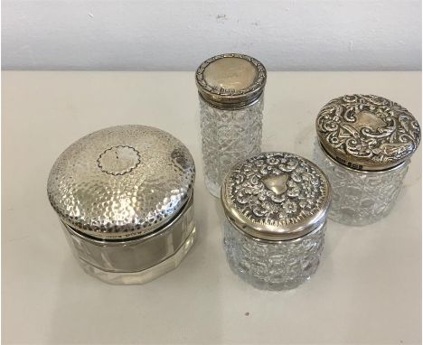 Four Silver Topped Trinket Boxes