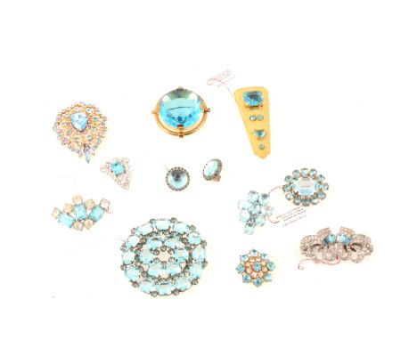 Vintage costume jewellery with faux aquamarines and blue topaz, gilt metal brooch with a 35mm brilliant cut stone, circular b