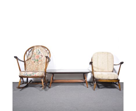 Ercol dark stained rocking chair, and a matching easychair; Ercol dark stained coffee table.