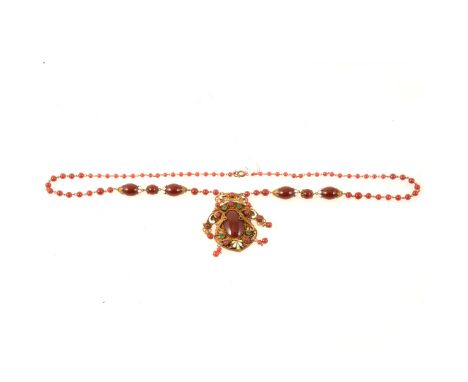 A vintage 1930's sautoir necklace, probably Max Neiger of Gablonz, cornelion coloured circular and egg shaped glass beads, gr