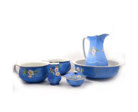 A Crown earthenware six-piece toilet set, blue ground, comprising jug, 32cm, basin, two chamber pots, soap dish and toothbrus