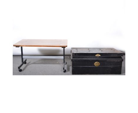 Old tin trunk, width 70cm; and an oak top coffee table. (2)
