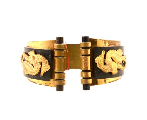 1930s Art Deco Hippocampe bangle retailed by JHP of Paris, and designed by Genevieve Hamon, the bangle set with black bakelit