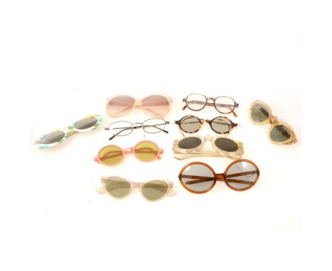 Nine pairs of vintage sunglasses, 1940's-1960's. a pair of perspex and plated metal glasses, two pairs with glitter, a pair o