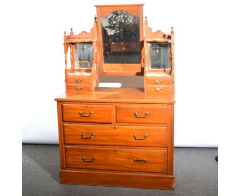 Edwardian satin walnut two-piece bedroom suite, comprising a single wardrobe, shaped pediment, mirror panelled door, two shor