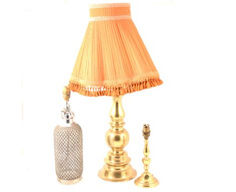 Three table lamps; one being a soda syphon adapted as a lamp.