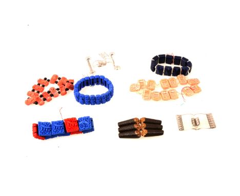 Five vintage pressed glass elasticated panel bracelets, blue floral bracelet 20mm wide, red and blue nine panel floral bracel