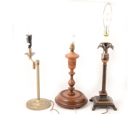 An Indian carved teak lamp base, 38cm; five other table lamps.