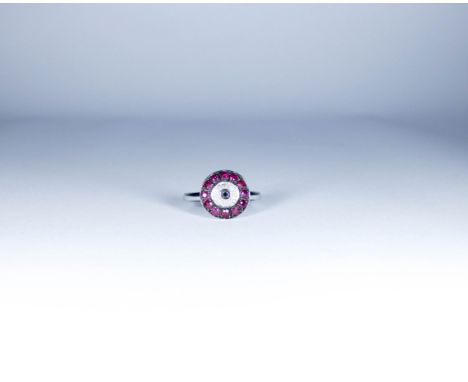 A ruby and diamond target ring, ring size L, total weight 2.6g