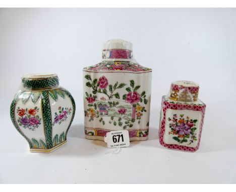 Three 19th century porcelain tea caddies with their lids decorated with flowers and foliage, height of tallest caddy 16cms