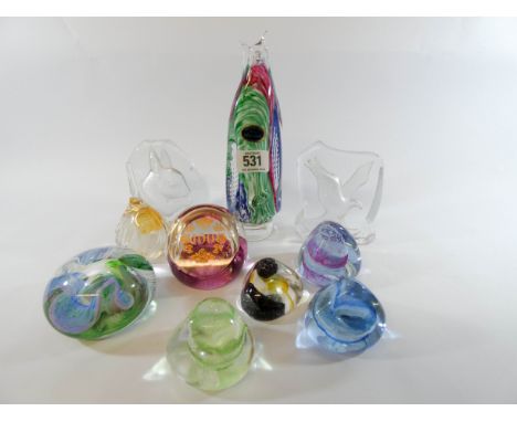 Ten various glass paperweights to include six Caithness examples and one by Murano   No obvious signs of damage or repair