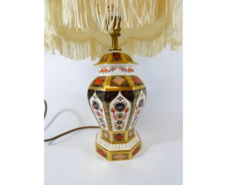 A Royal Crown Derby old Imari pattern octagonal baluster lamp base with fringe shade, height to top of light fitting 32cms 