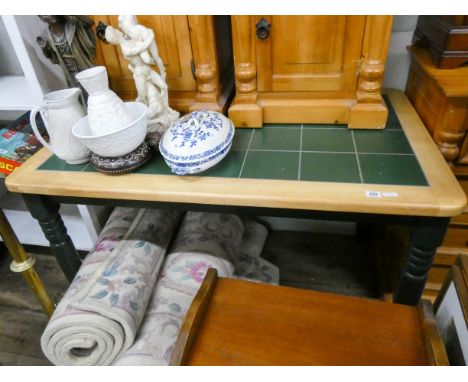 A light beech and green tile top kitchen table together with four matching slat back chairs 