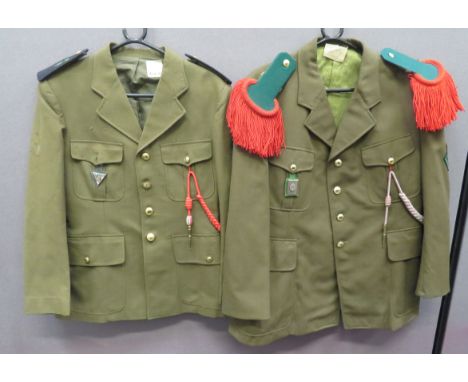 Two French Foreign Legion Tunics consisting khaki, single breasted, open collar tunic. &nbsp;Pleated chest pockets and lower 