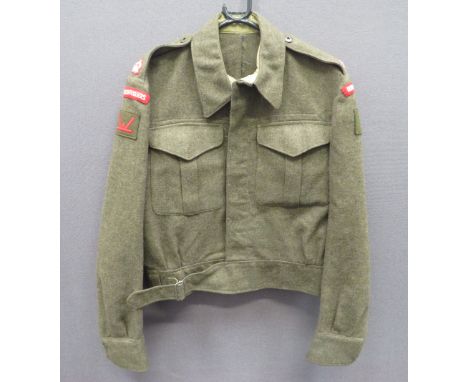 Royal Welch Fusiliers Officer's WW2 Battle Dress Tunic khaki green, single breasted tunic. &nbsp;Turn over collar. Pleated ch