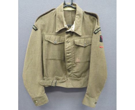 Hampshire Regiment 1944 Dated 1940 Pattern Battle Dress Jacket khaki, single breasted tunic. &nbsp;Turn over collar. &nbsp;Pa