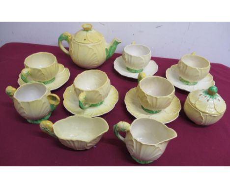 Carlton Ware Yellow Buttercup tea service, comprising five cups and saucers, milk jug and sugar bowl, with similar small jug,