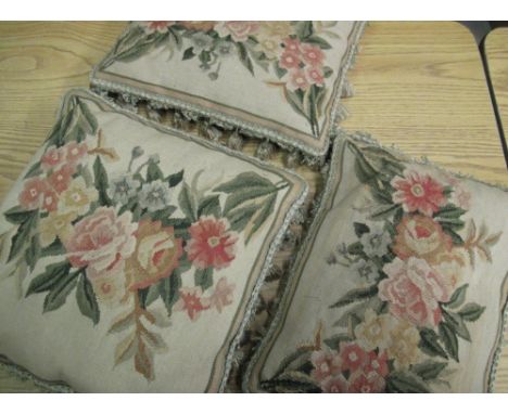20th C pair of needlework tapestry cushions with tassel borders and a similar larger square cushion (3) 