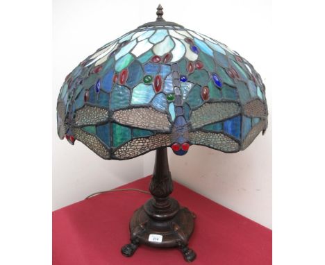 Verdigris metal table lamp, with acanthus cast column on four paw feet with Tiffany dragonfly style shade H70cm W54cm 