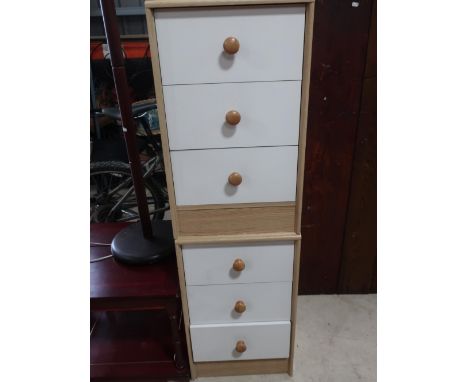 Pair of 3 drawer light oak laminate bedside chests 
