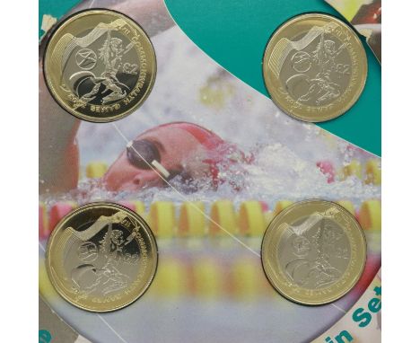 2002 Commonwealth Games Souvenir Coin Set of four £2 coins, in sleeve with certificate. UK P&amp;P Group 1 (£16+VAT for the f