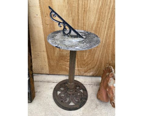 A VINTAGE CAST ALLOY SUN DIAL WITH CAST IRON BASE 